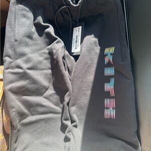 Kith Black Sweatpants with Multicolor Stripe Logo